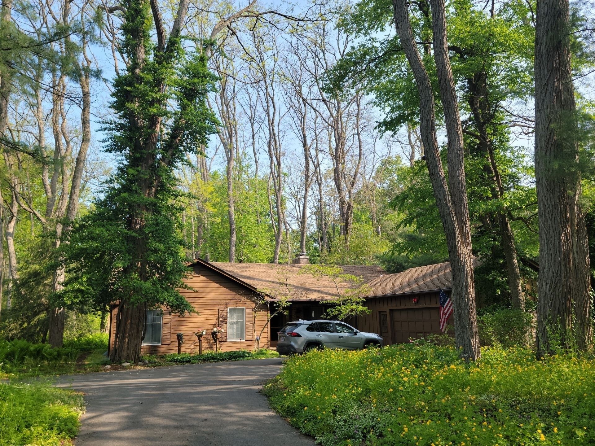  Tranquil Retreat in Serene Wooded Neighborhood of Pittsford, NY.