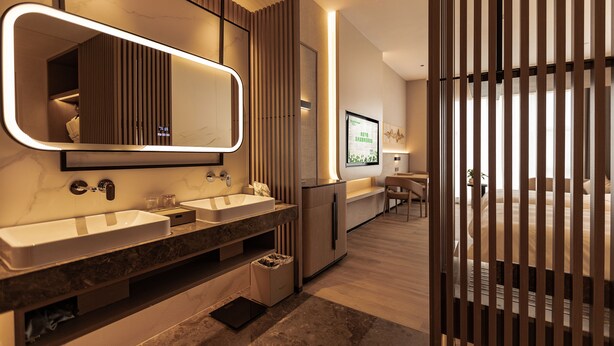 A modern bathroom with dual sinks, a large mirror, and a wooden partition. - Wyndham Garden Gaozhou (Maoming)