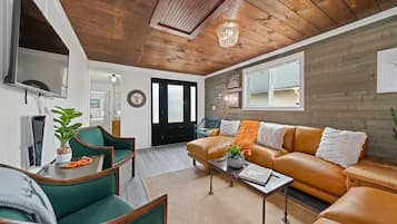 Smart TV, fireplace, video game console, books