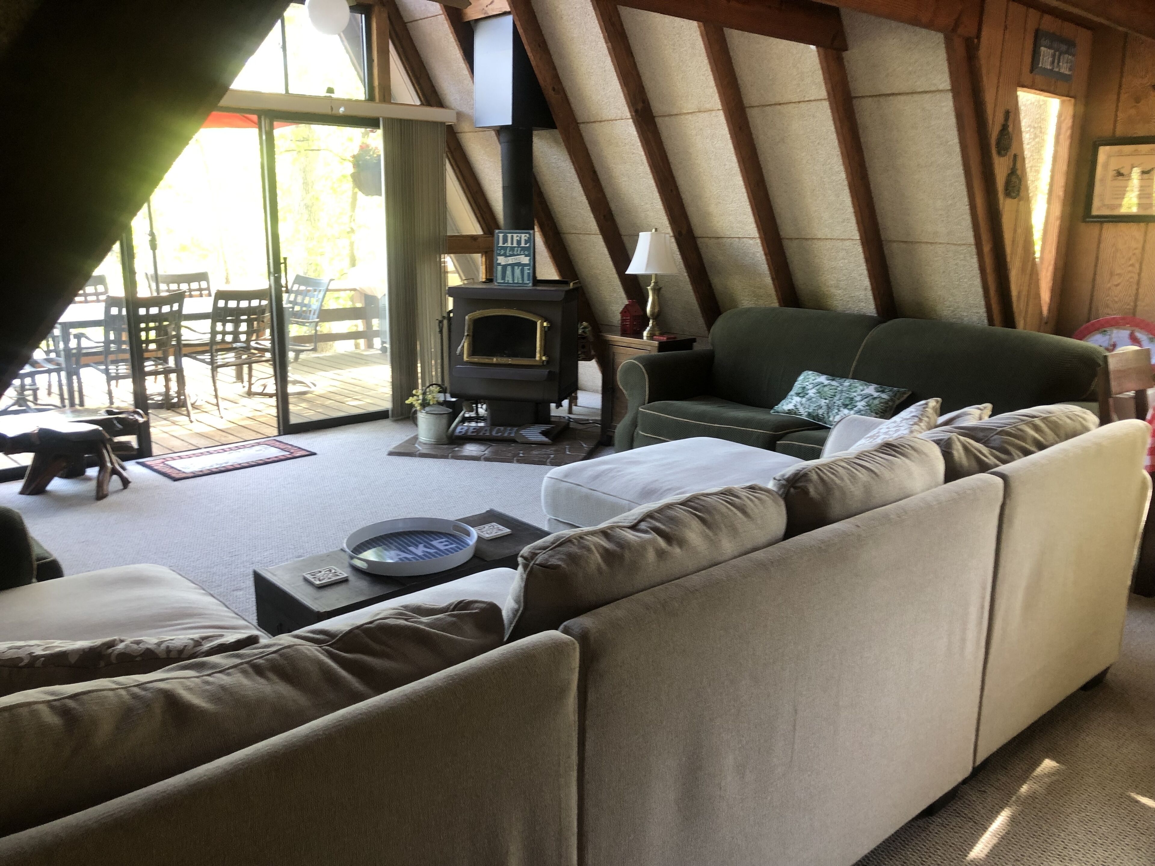 Fabulous chalet surrounded by a lake with rocked shoreline for water fun!