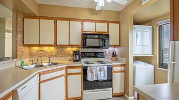 Condo | Private kitchen | Full-sized fridge, microwave, oven, stovetop
