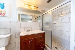 Shower, towels, soap, toilet paper