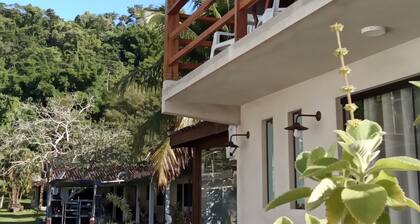 Ilhinha II suite in a private condominium, located in the heart of Ilhabela!