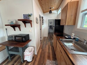 Fridge, microwave, coffee/tea maker, toaster