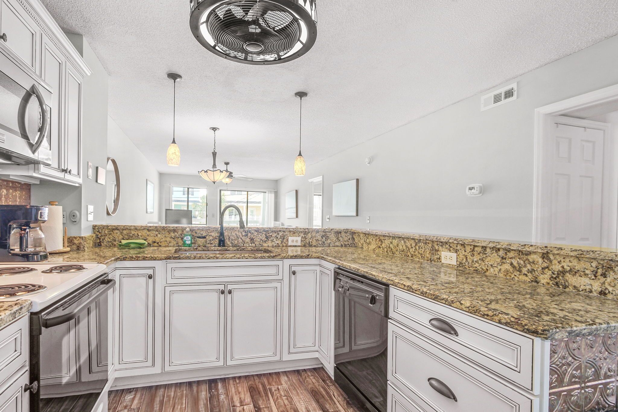 2nd Row Beach Condo, steps to the beach with free golf cart and pool