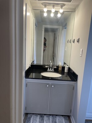 Hair dryer, towels, soap, shampoo