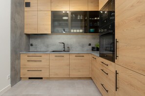 Apartment, 1 Bedroom, Sauna, Sea Facing | Private kitchen | Full-size fridge, microwave, oven, stovetop - Pet-friendly Spadochroniarzy by Renters (Dziwnów)