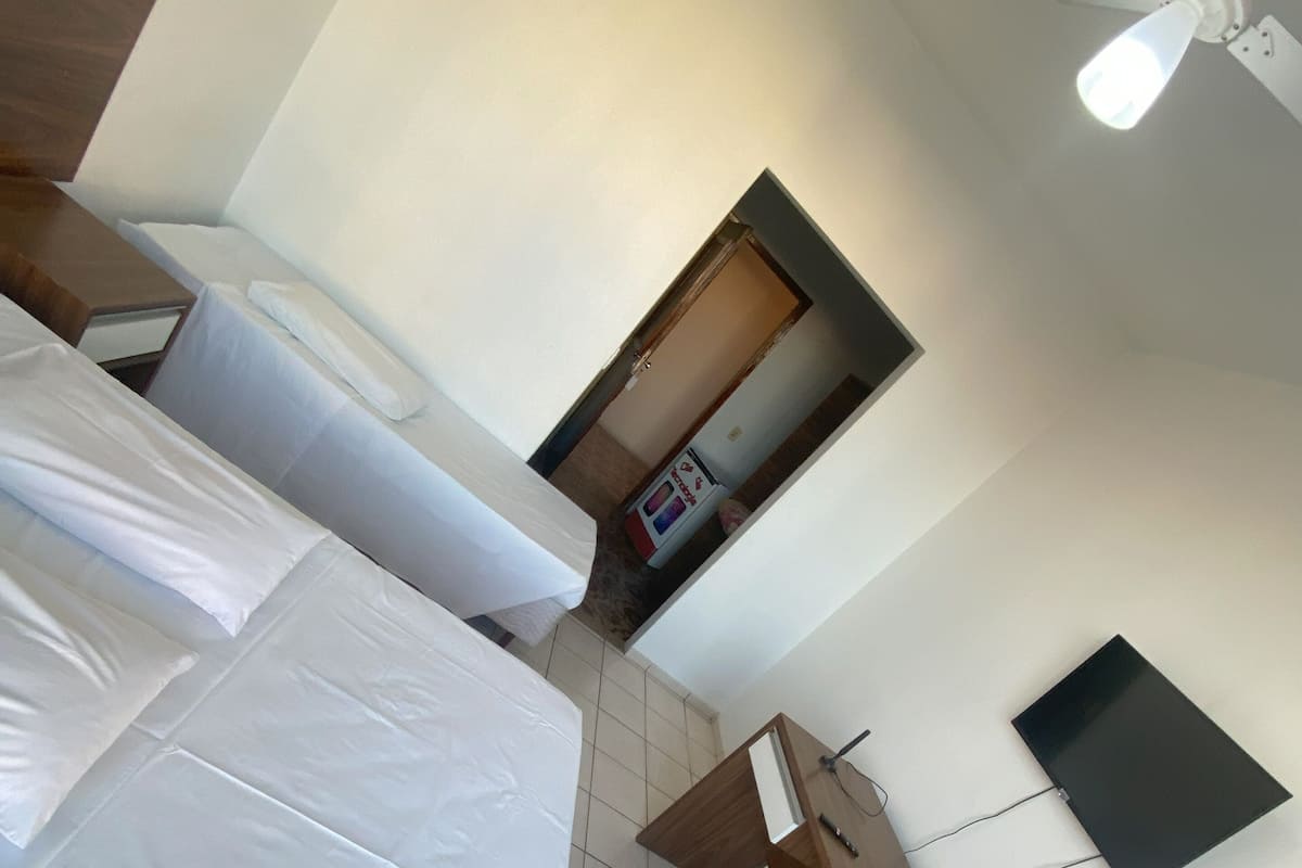 Premium bedding, desk, laptop workspace, free WiFi