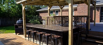 Oasis in the middle of town for large groups with pool and 2 Master bedrooms.