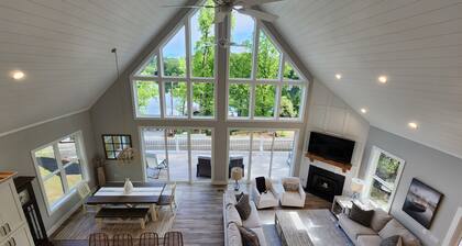 Brand new house with boat house on a spring fed private lake.