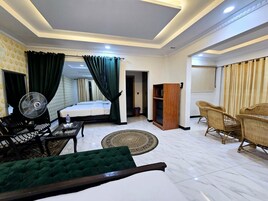 Deluxe Quadruple Room | Premium bedding, laptop workspace, free WiFi, bed sheets