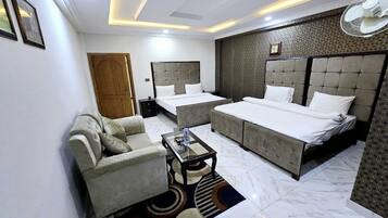 Premium bedding, laptop workspace, free WiFi, bed sheets