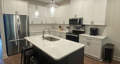 Brand New! 2.2 miles to football stadium. 2.5 to Toomer’s Corner. EV outlet.