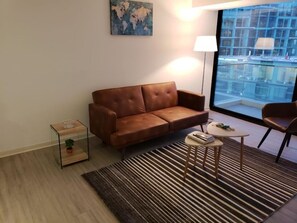 Luxury Apartment | Living area | 42-inch LCD TV with satellite channels, TV - Hotel Alto Antofagasta (Antofagasta)