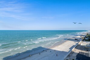 On the beach, sun-loungers, beach towels