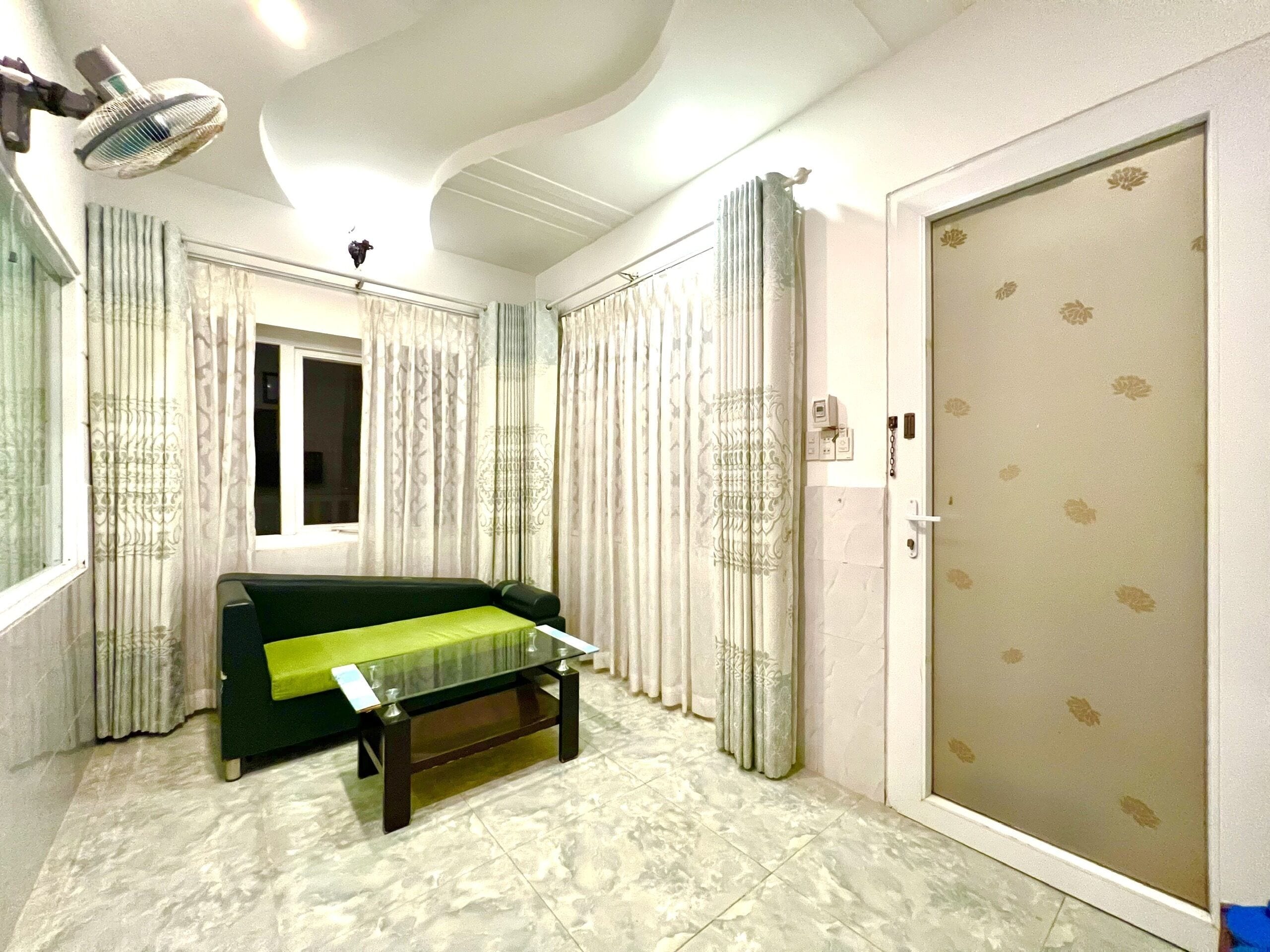 family apartment | living area | flat-screen tv