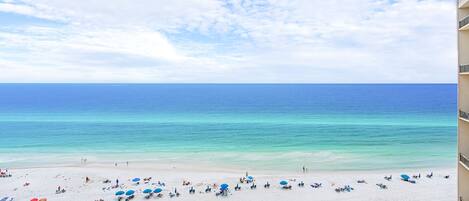 On the beach, sun loungers, beach towels
