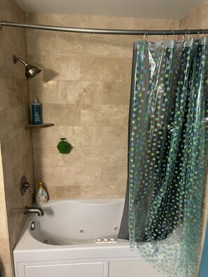 Jetted bath, hair dryer, towels, soap
