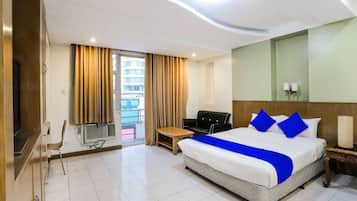 Habitación superior | Decoración individual, escritorio, cortinas opacas y wifi gratis