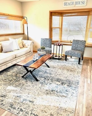 Living room with bay windows and natural light