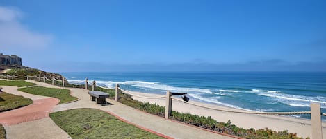 On the beach, sun-loungers, beach towels