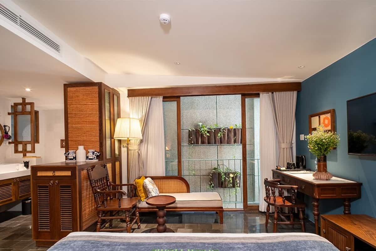 Camera Deluxe | Biancheria da letto di alta qualità, minibar, una cassaforte in camera