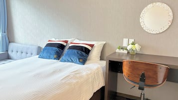 エコノミー ダブルルーム ダブルベッド 1 台 禁煙 シティビュー | 1 室のベッドルーム、ノートパソコン用作業スペース、WiFi (無料)、ベッドシーツ