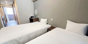 コンフォート ツインルーム | 1 室のベッドルーム、デスク、WiFi (無料)、ベッドシーツ