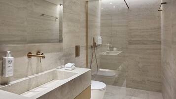 Shower, hair dryer, slippers, towels