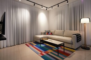 Classic Apartment | Living area | 100-cm LCD TV with satellite channels, TV - Yehuda Market Suite (Jerusalem)