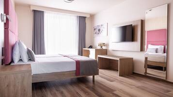 Superior Twin kamer | Bedden met traagschuimmatrassen, een minibar, een kluis op de kamer