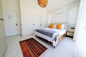 4 عدّة غرف نوم ومكواة/لوح كي وواي فاي وملاءات أسرّة