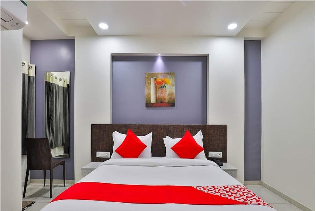 Habitación Deluxe | Escritorio, wifi gratis, ropa de cama y acceso para silla de ruedas