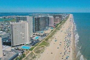 On the beach - Swanky 2 Bedroom Oceanfront Condo with Outdoor Pool, WiFi, and Great Beach View from open balcony. Linen & towels included. (Ocean City)