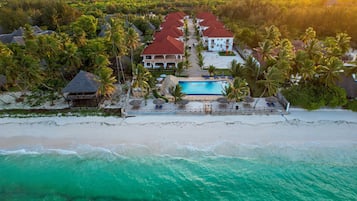 Private beach, white sand, sun loungers, beach umbrellas