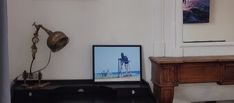 Studio, separate bedroom. Large, bright living room. Close to shops.