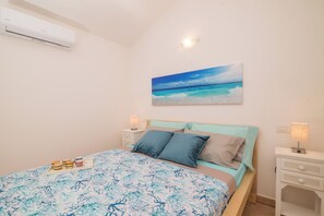 Standard-Apartment, Mehrere Schlafzimmer (Glori House 50m from Marina di Olbia) | 1 Schlafzimmer, Bettwäsche