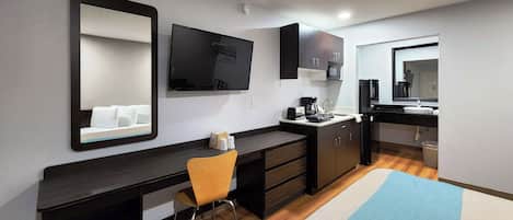Desk, laptop workspace, blackout curtains, iron/ironing board