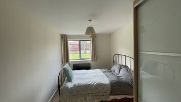 Apartment, 1 Queen Bed | 1 bedroom, free WiFi, bed sheets