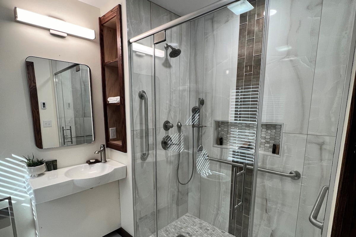 Bathroom | Shower, designer toiletries, hair dryer, bathrobes