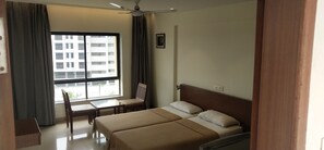 Individually decorated, individually furnished, desk, laptop workspace - Hotel Sumanchandra Suites  (Nashik)