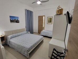 3 bedrooms, desk, iron/ironing board, travel cot