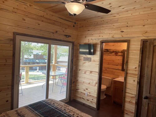 Lake view 2 bedroom cabin that sleeps 6. Private deck and fire pit area.