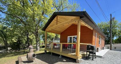 Lake view 2 bedroom cabin that sleeps 6. Private deck and fire pit area.