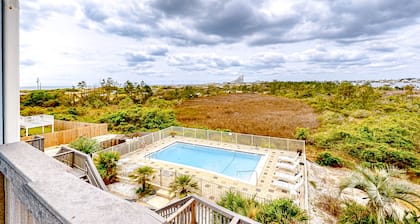 Inviting home with pool, Gulf view, tennis, patio, central AC, & W/D