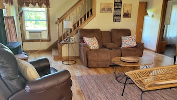 Smart TV, fireplace, books, video library