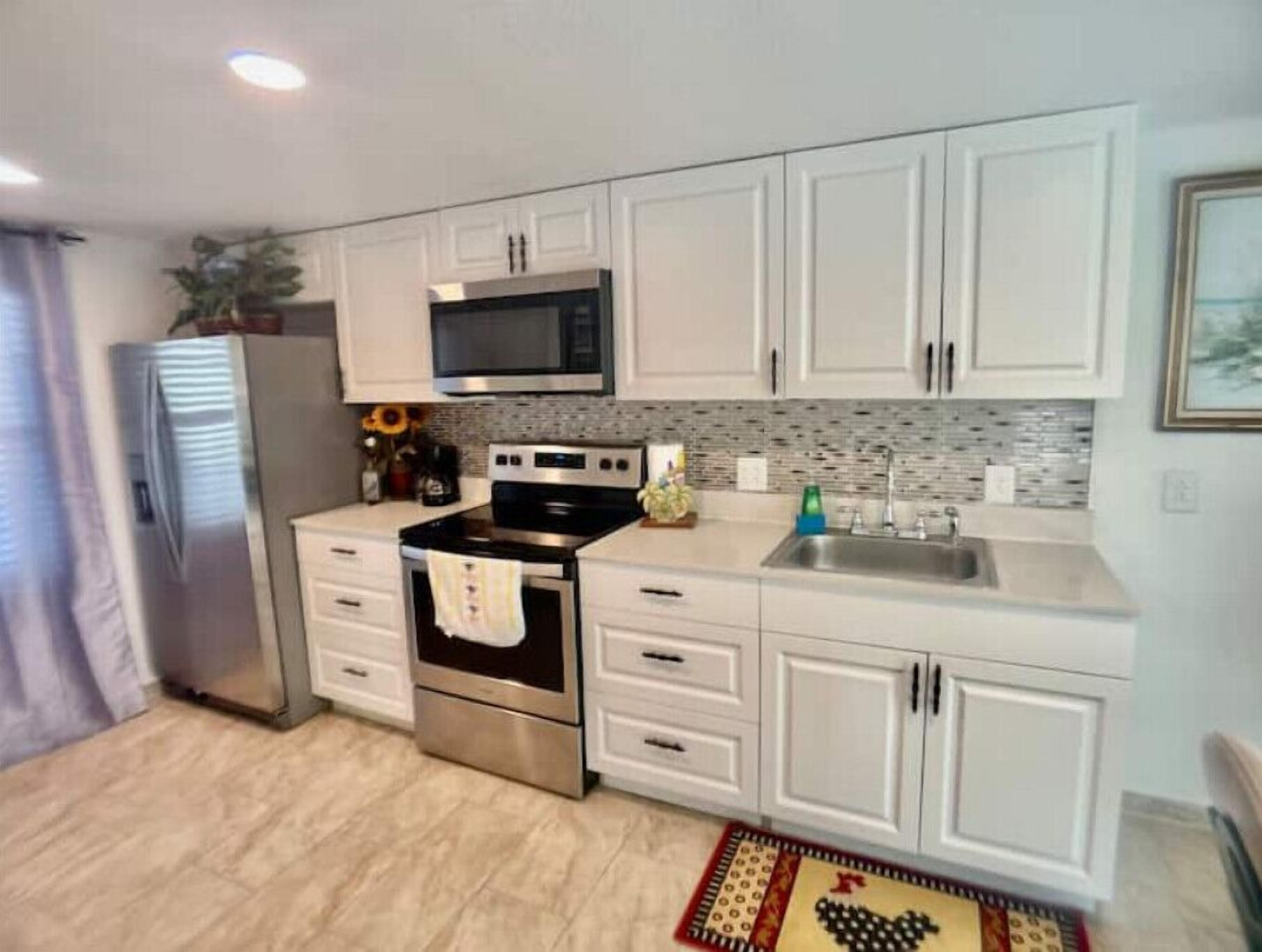 Refrigerador, microondas, horno, placa de cocina