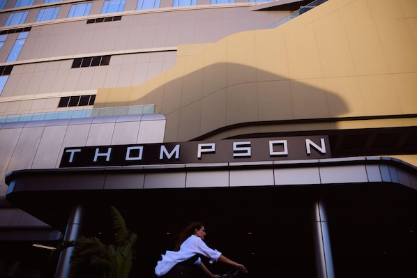 A building with the name 'THOMPSON' on the facade.