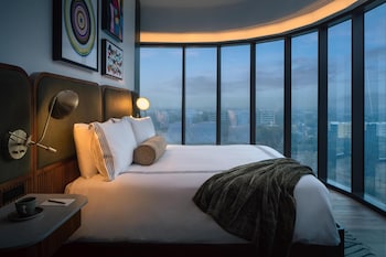 Room (Panoramic) | Premium bedding, pillowtop beds, minibar, in-room safe at Thompson Houston, by Hyatt