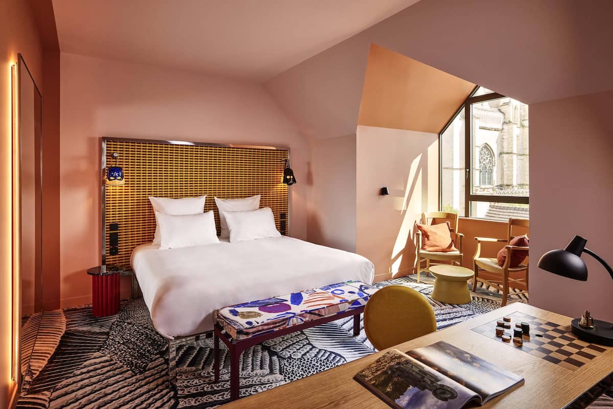 Premium bedding, pillow-top beds, in-room safe, desk